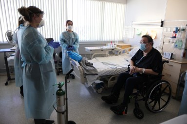 Daniel Kim, 48, prepares to leave St. Jude Medical Center after five months after surviving the coronavirus disease (COVID-19), in Fullerton