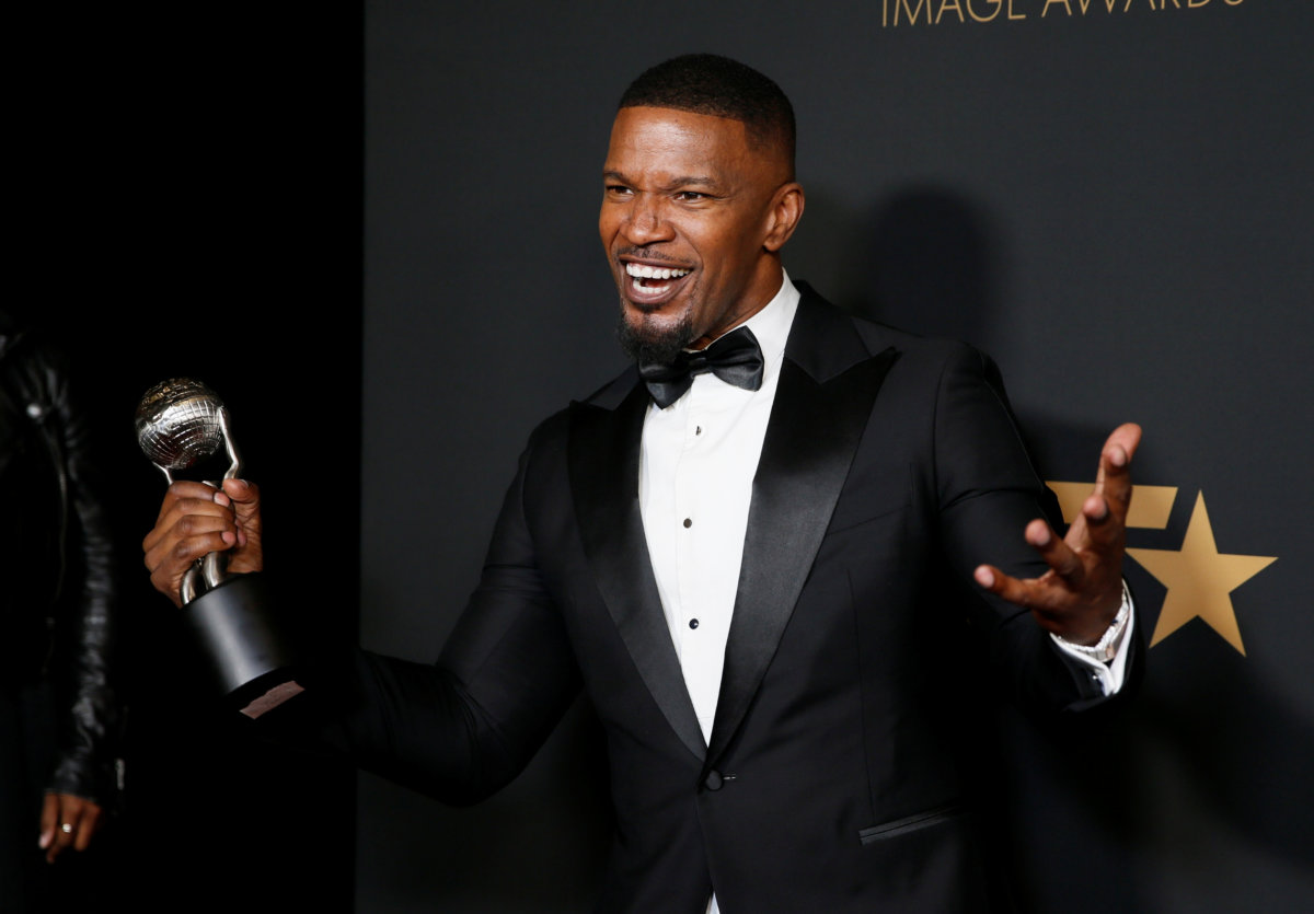 FILE PHOTO: 51st NAACP Image Awards – Photo Room– Pasadena – Jamie Foxx poses backstage with his Outstanding Supporting Actor in a Motion Picture award for “Just Mercy