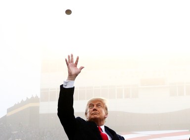 FILE PHOTO: U.S. President Trump participates in a pre-game coin toss ahead of the annual Army-Navy collegiate football game at Michie Stadium, in West Point