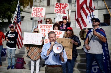 Supporters of U.S. President Donald Trump protest in front of the Pennsylvania Commonwealth capitol building in Harrisburg