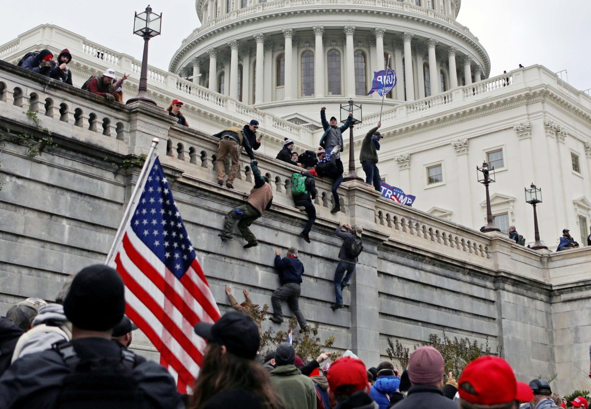 FILE PHOTO: Supporters of U.S. President Donald Trump protest outside the Capitol in Washington