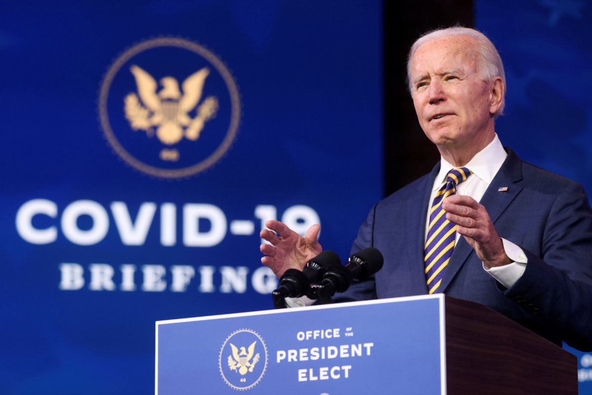 FILE PHOTO: FILE PHOTO: U.S. President-elect Joe Biden delivers remarks on the U.S. response to the coronavirus disease (COVID-19) outbreak, at his transition headquarters in Wilmington