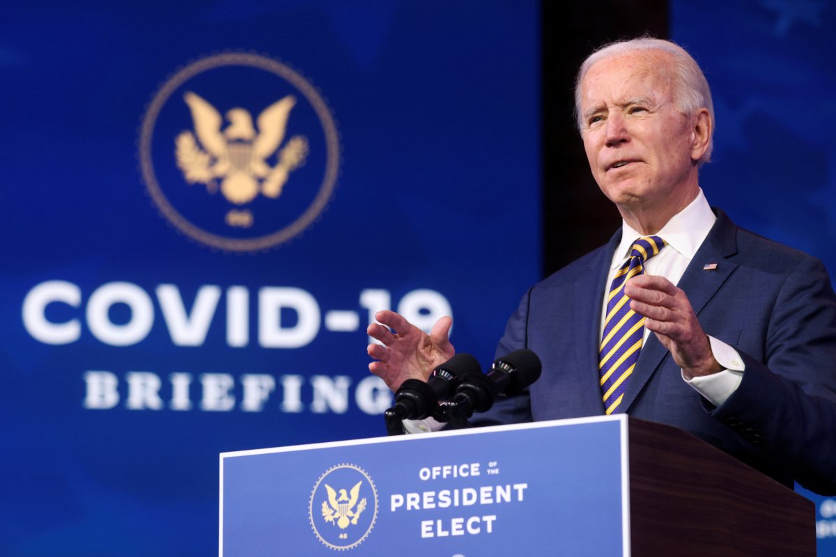 FILE PHOTO: FILE PHOTO: U.S. President-elect Joe Biden delivers remarks on the U.S. response to the coronavirus disease (COVID-19) outbreak, at his transition headquarters in Wilmington