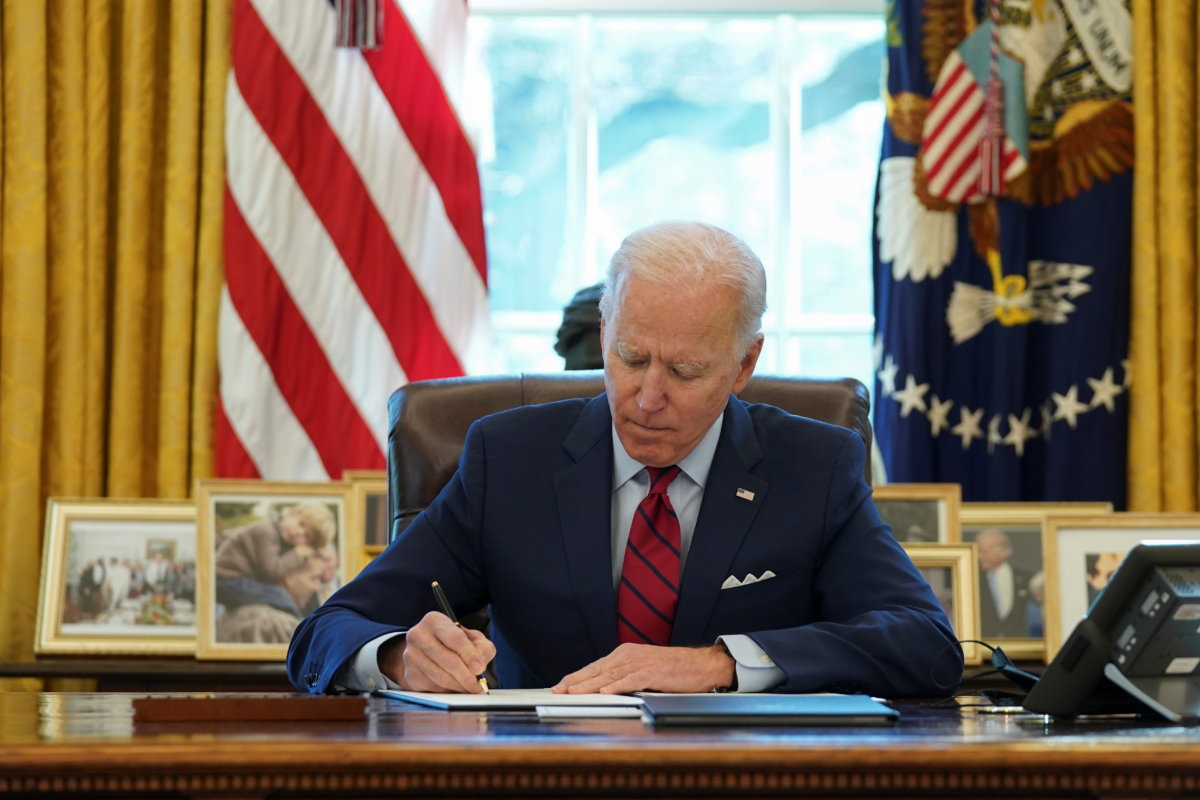 U.S. President Biden signs executive orders on access to affordable healthcare in Washington