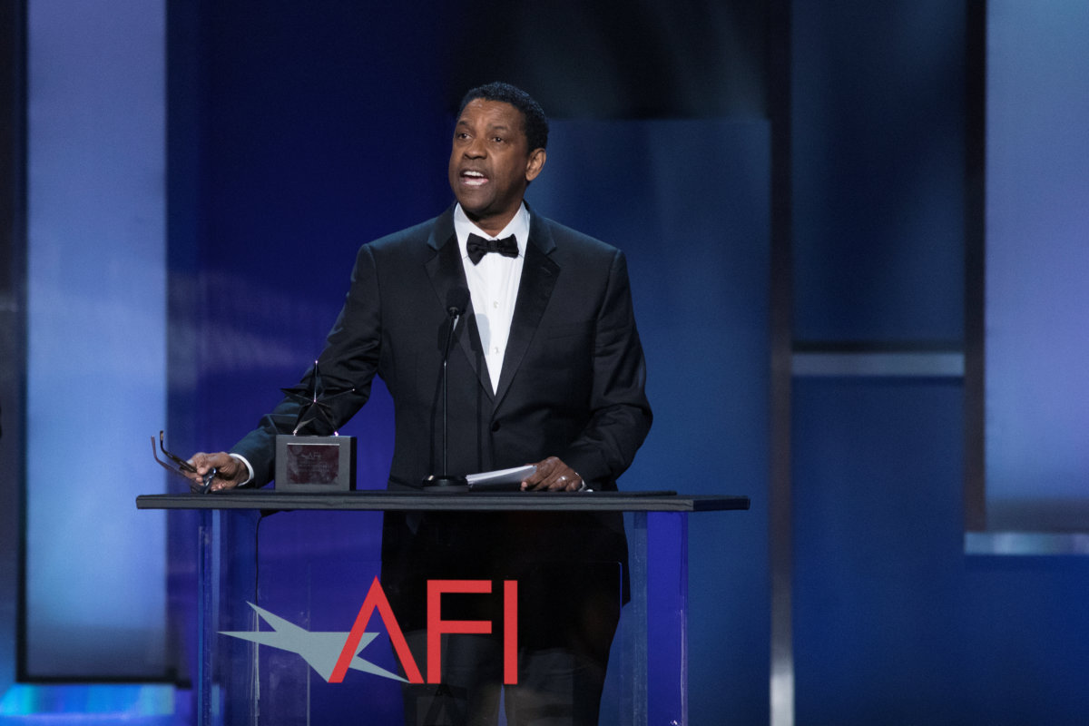 FILE PHOTO: Actor Denzel Washington accepts the 47th AFI Life Achievement Award at the gala honoring him in Los Angeles