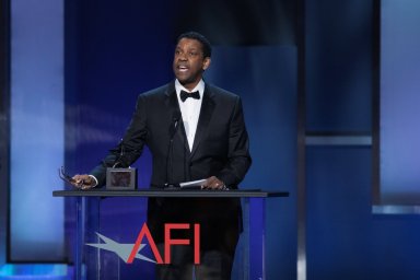 FILE PHOTO: Actor Denzel Washington accepts the 47th AFI Life Achievement Award at the gala honoring him in Los Angeles