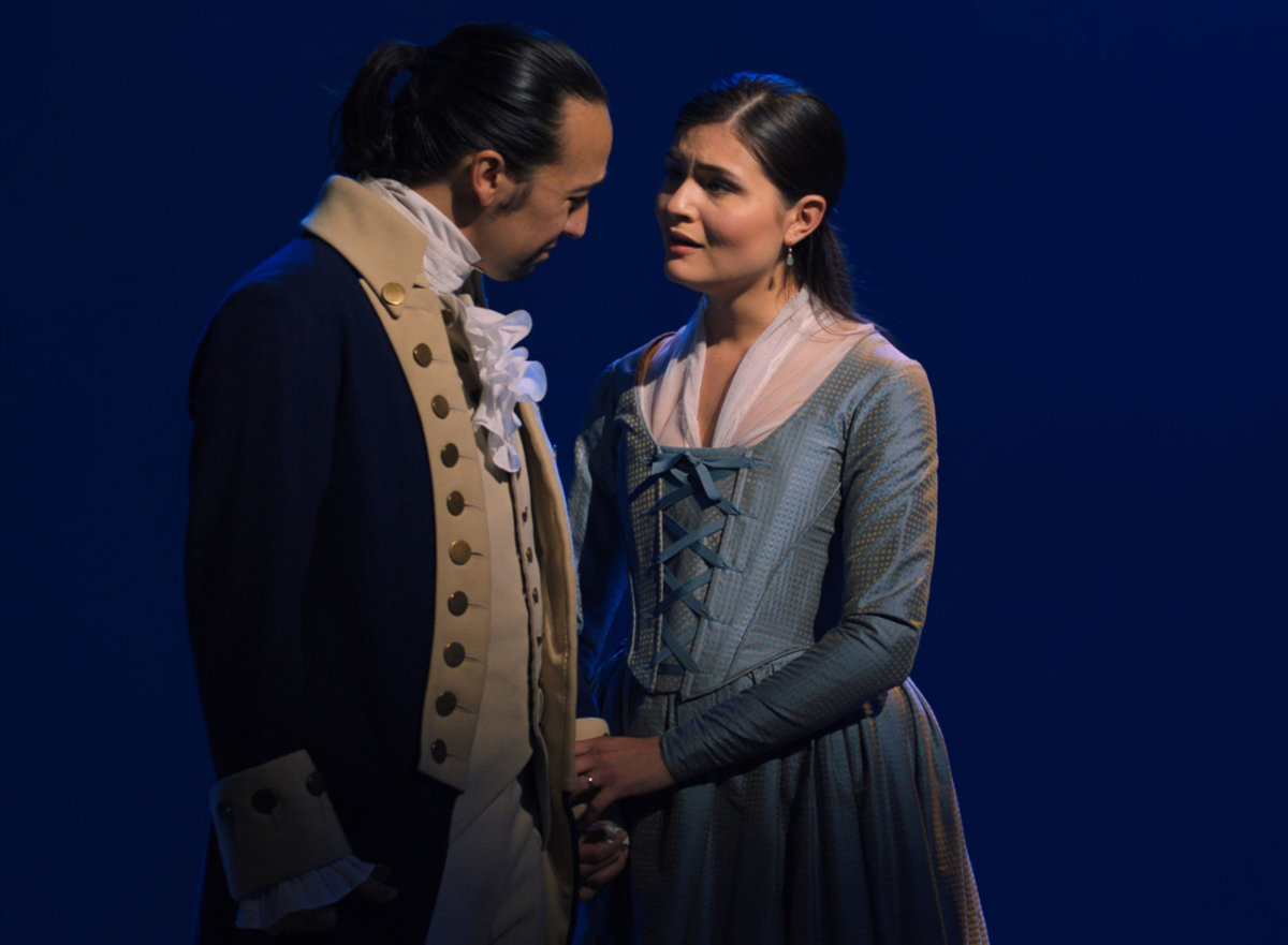 Lin-Manuel Miranda is Alexander Hamilton and Phillipa Soo is Eliza Hamilton in “Hamilton,” the filmed version of the original Broadway production