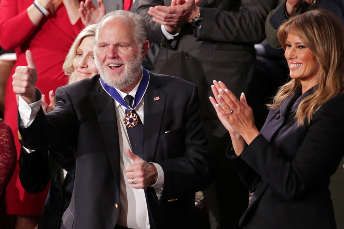 FILE PHOTO: Conservative radio talk show host Rush Limbaugh reacts as he is awarded the Presidential Medal of Freedom in Washington