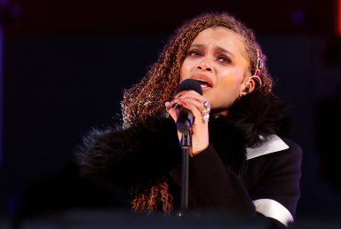 FILE PHOTO: Day performs in Times Square on New Years Eve in New York City