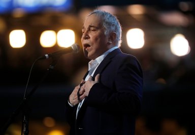 FILE PHOTO: Paul Simon performs during the Democratic National Convention in Philadelphia