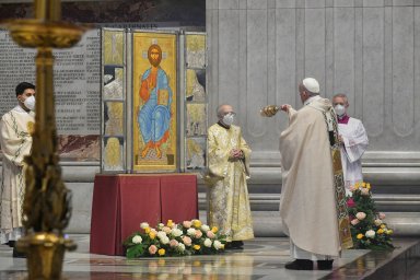 Pope Francis celebrates the Eucharist during Easter Sunday Mass at St. Peter’s Basilica at the Vatican