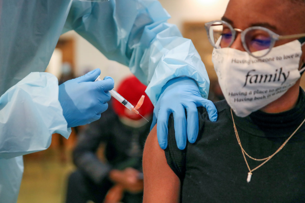FILE PHOTO: People receive COVID-19 vaccines in Chicago