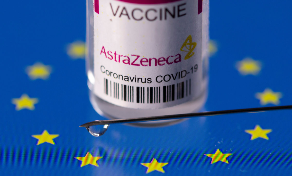 FILE PHOTO: Vial labelled “AstraZeneca coronavirus disease (COVID-19) vaccine” placed on displayed EU flag is seen in this illustration picture