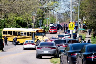 Police attend a shooting at Austin-East Magnet High School in Knoxville