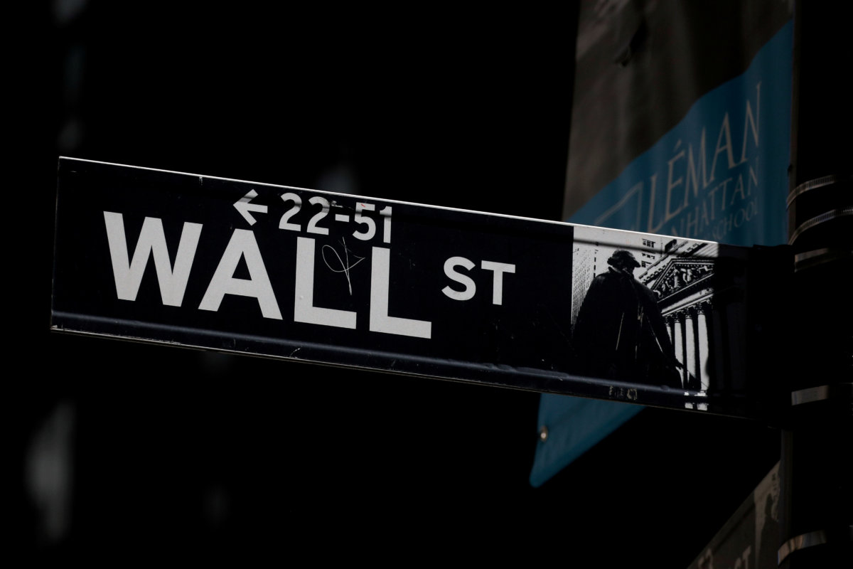 FILE PHOTO: A Wall St. street sign is seen near the NYSE in New YorkNYSE in New York