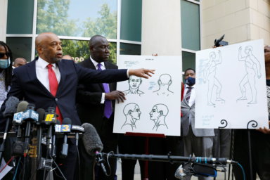 Autopsy diagrams are displayed at a news conference about Black man killed by sheriffs in Elizabeth City