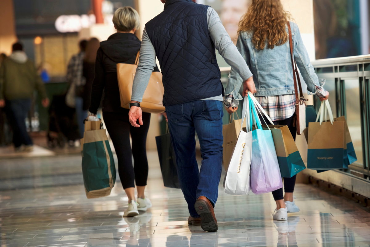 FILE PHOTO: Shoppers carry bags of purchased merchandise at the King of Prussia Mall, United States’ largest retail shopping space, in King of Prussia