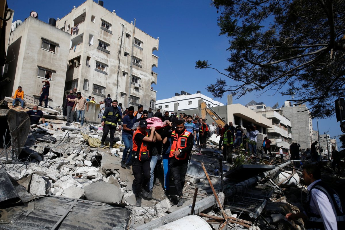 Rescue search for victims at the site of Israeli air strikes, in Gaza City