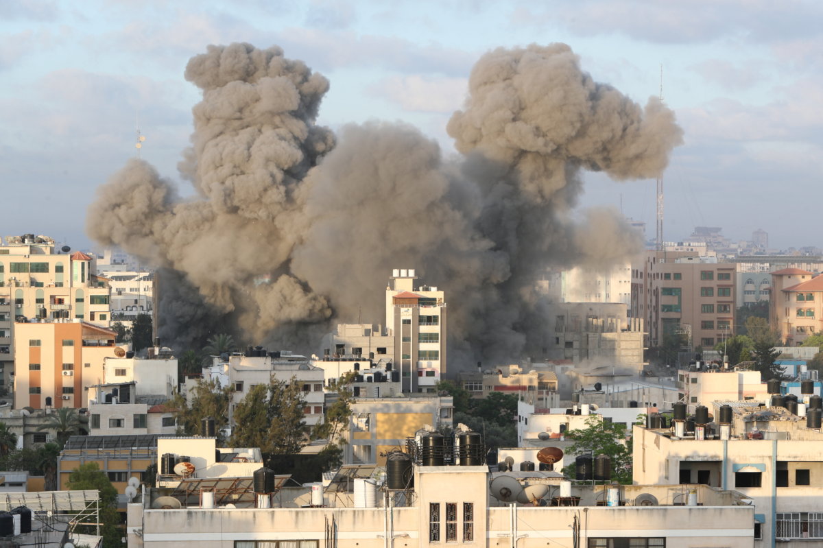 Smoke rises following an Israeli air strike on a building, amid a flare-up of Israeli-Palestinian fighting, in Gaza City