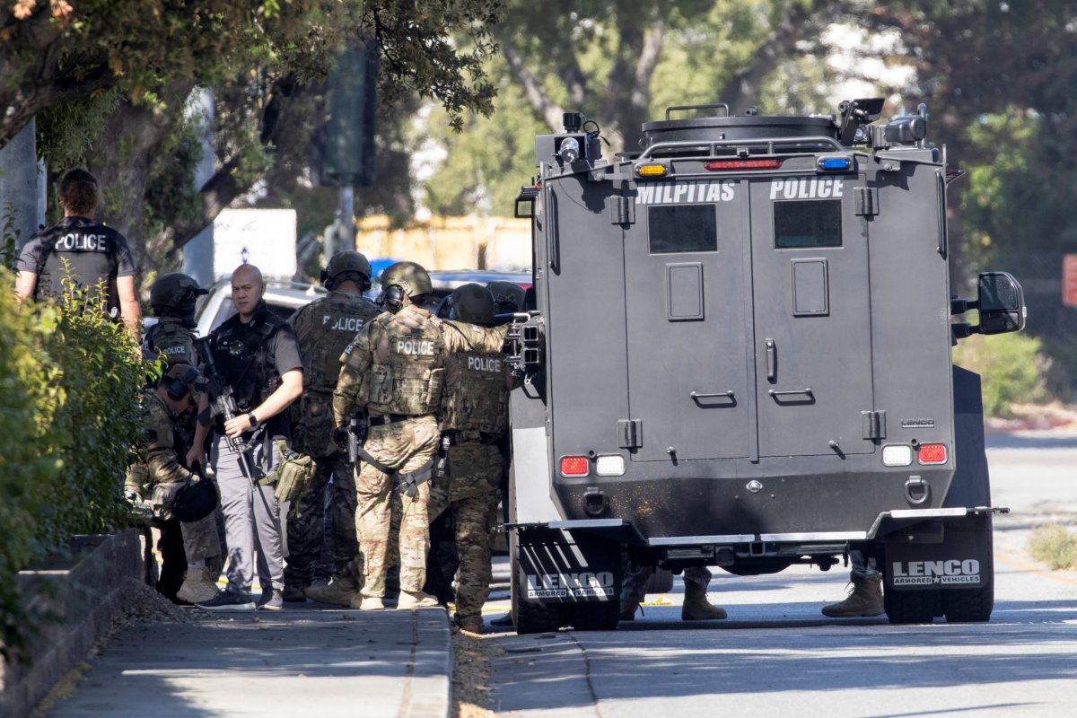 Police secure the scene of a mass shooting in San Jose