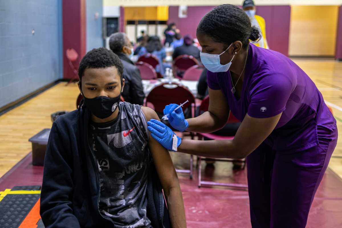 Adolescents receive COVID-19 vaccine