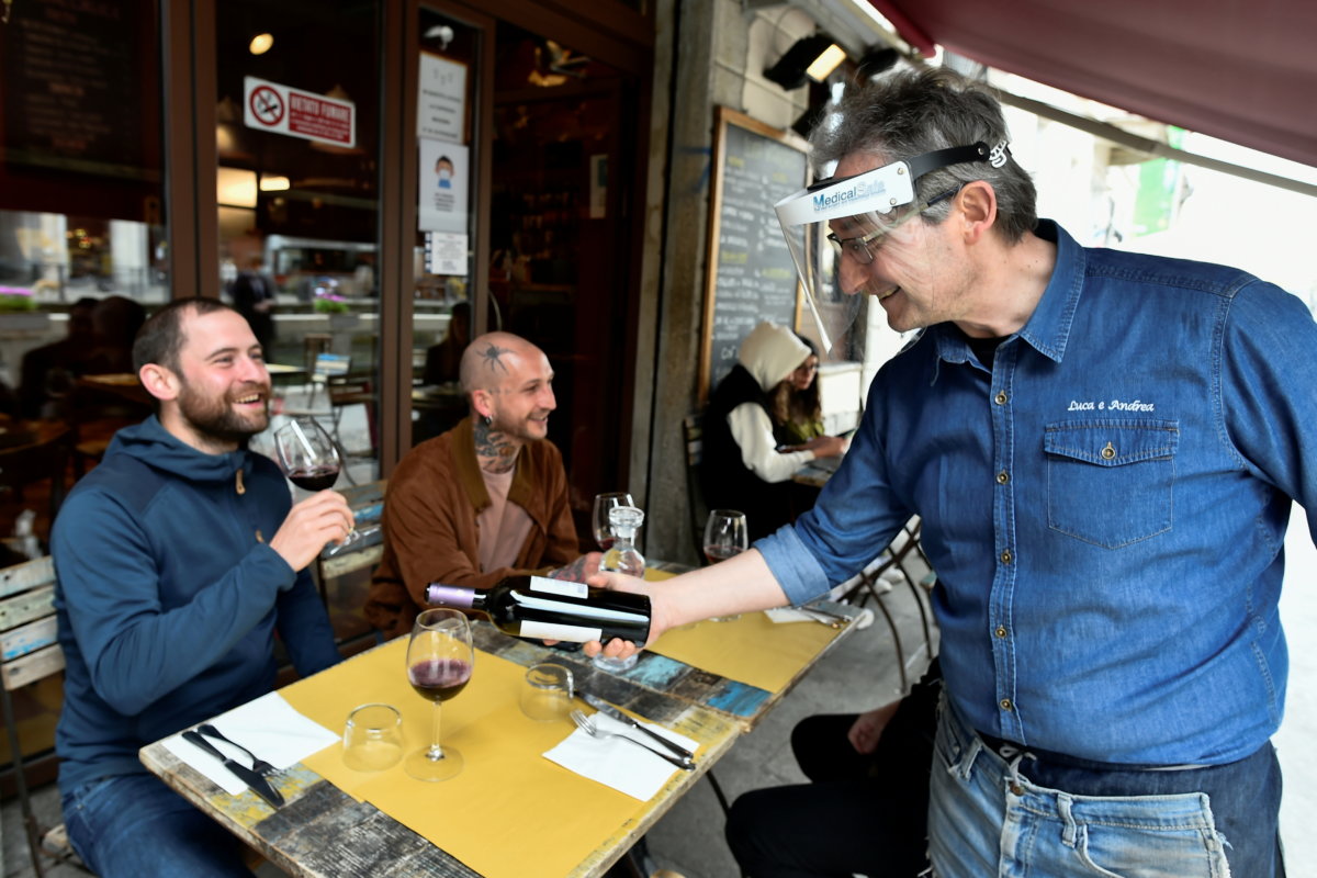 FILE PHOTO: Bars and restaurants reopen as Italy eases COVID-19 restrictions, in Milan