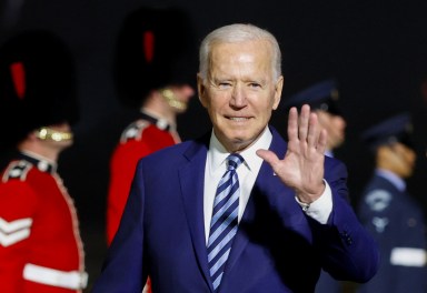 U.S. President Joe Biden waves upon arrival at Cornwall Airport Newquay, near Newquay