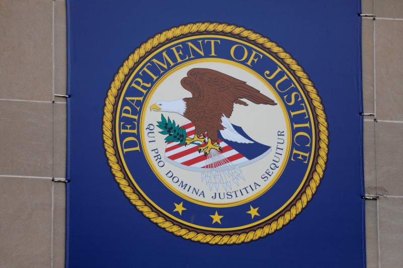 FILE PHOTO: The crest of the United States Department of Justice (DOJ) is seen at their headquarters in Washington, D.C.