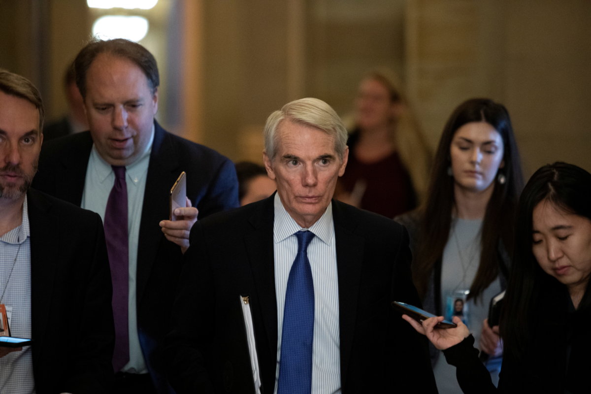 Senators arrive for a vote on Capitol Hill in Washington