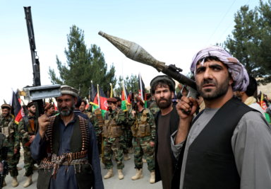 FILE PHOTO: Hundreds of armed men gather to announce their support for Afghan security forces on the outskirts of Kabul
