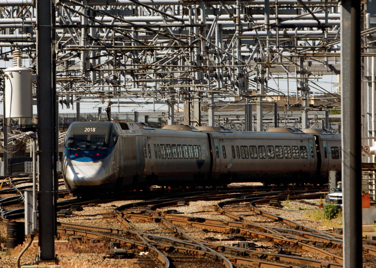 FILE PHOTO: An Amtrak Acela Express train departs South Station in Boston