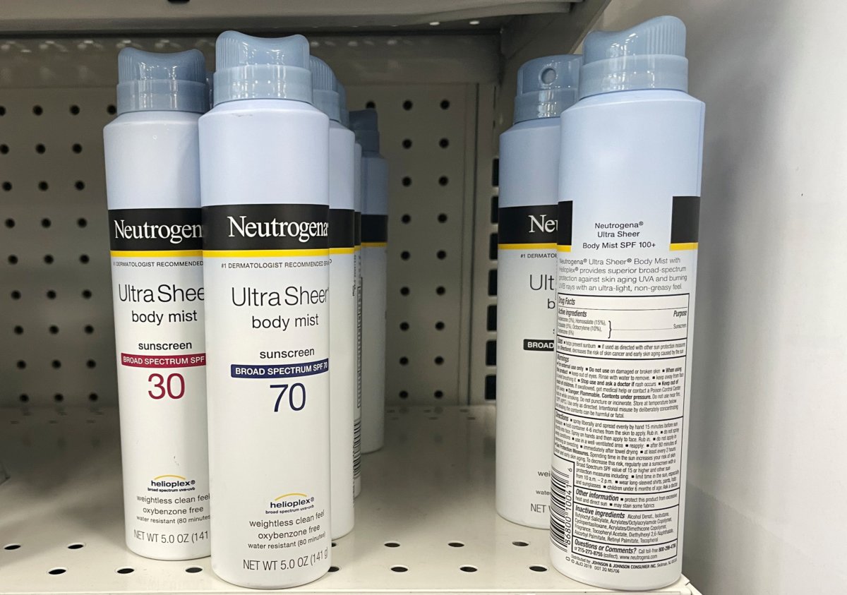 Sunscreens being recalled by Johnson & Johnson sit on a store shelf in Gloucester