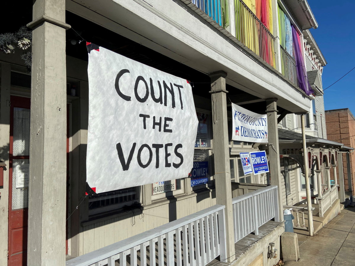 FILE PHOTO: A sign urging people to vote is seen on the porch of the Democratic Party’s Fulton County headquarters on Election Day in McConnellsburg, Pennsylvania