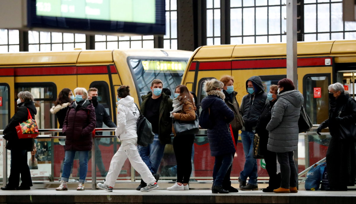 FILE PHOTO: Passengers wear face masks at Friedrichstrasse station during COVID-19 lockdown in Berlin