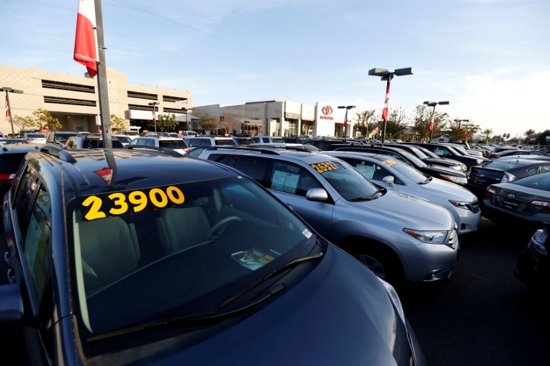 FILE PHOTO: Vehicles for sale are pictured on the lot at AutoNation Toyota dealership in Cerritos