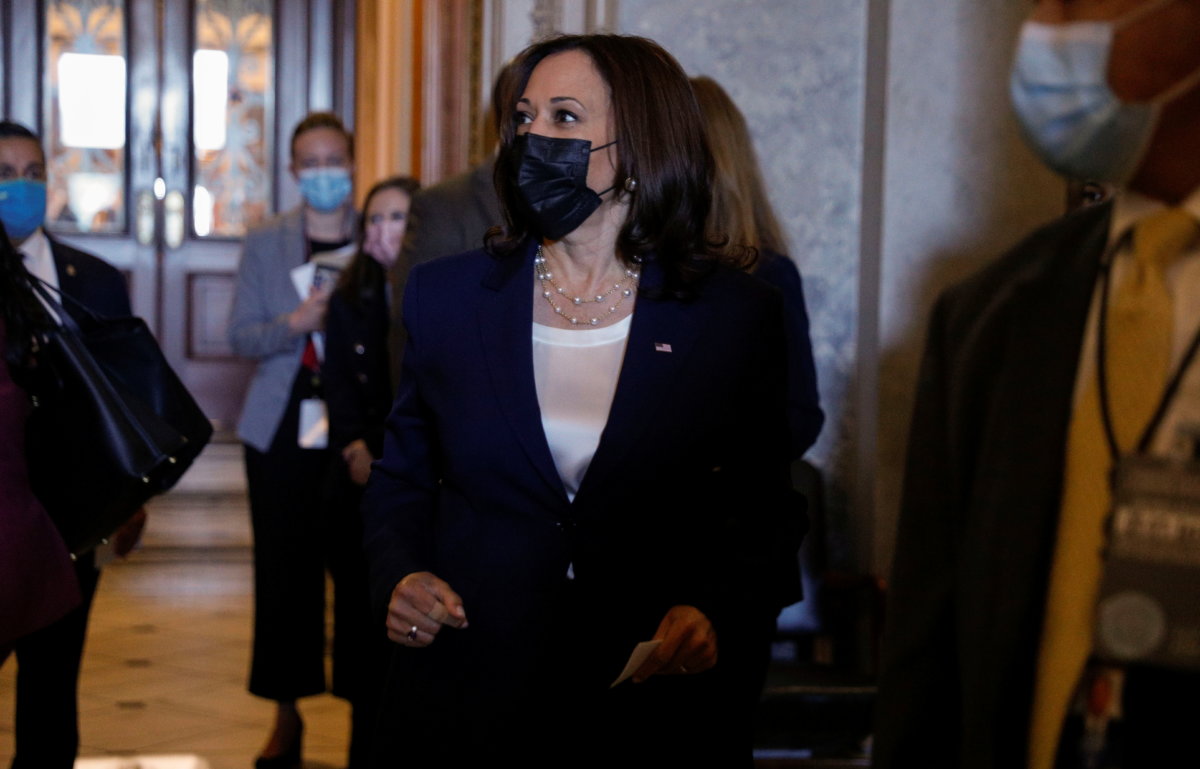 Vice President Harris leaves after the Senate passed $1 trillion infrastructure bill on Capitol Hill in Washington