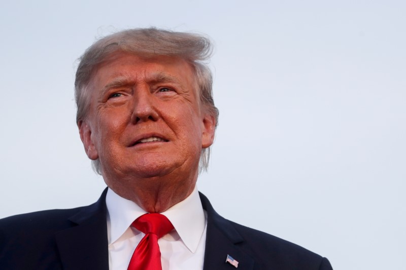 FILE PHOTO: Former U.S. President Trump holds a rally in Wellington, OH