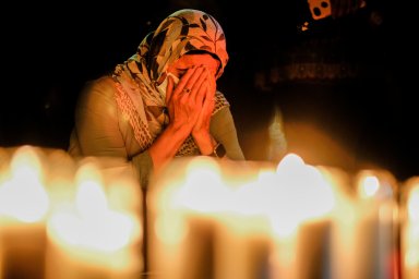 People attend a vigil for Afghanistan in Los Angeles