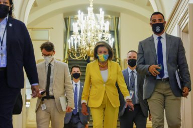 U.S. House Speaker Pelosi arrives for a House Democratic caucus meeting at the U.S. Capitol in Washington