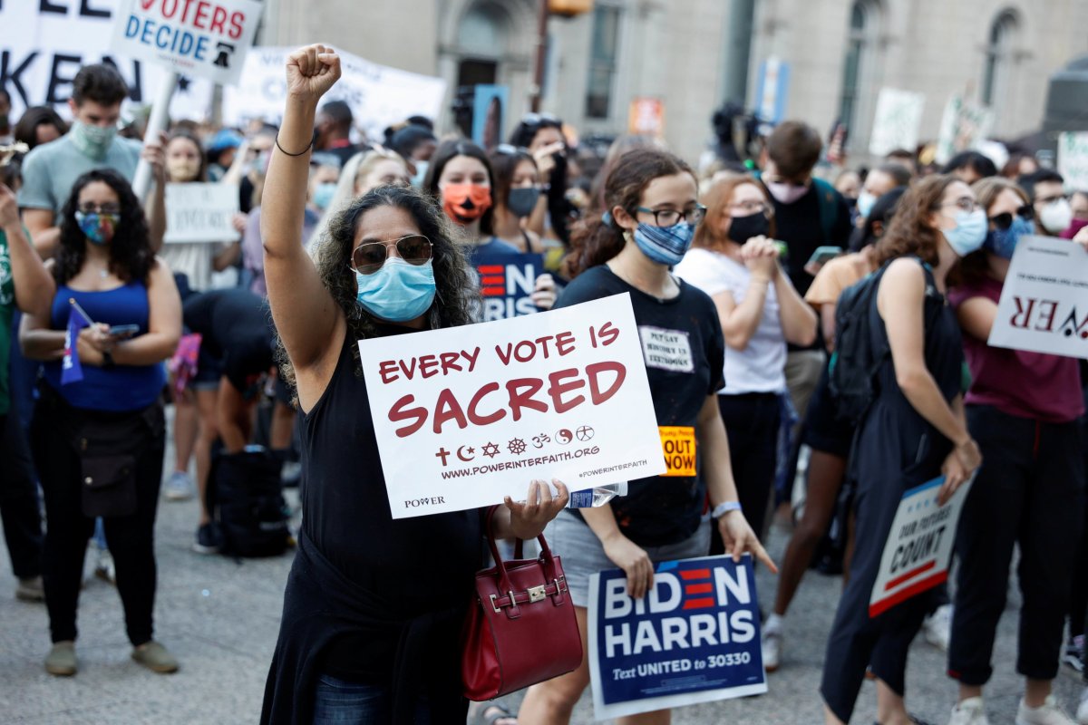 People gather as they celebrate media announcing that Democratic U.S. presidential nominee Joe Biden has won the 2020 U.S. presidential election, in Philadelphia