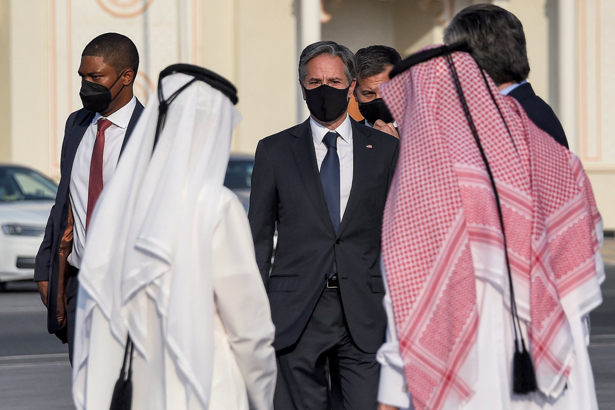 U.S. Secretary of State Antony Blinken arrives to board an aircraft to depart from Old Doha Airport