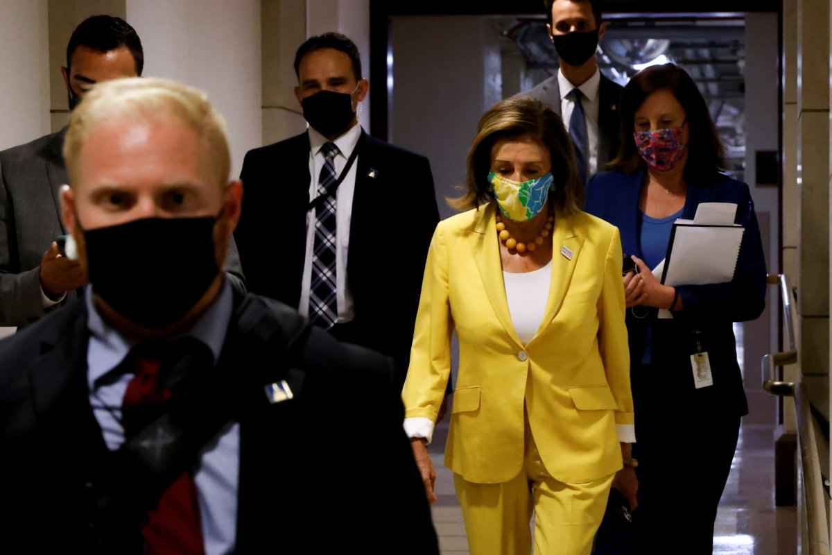 FILE PHOTO: U.S. House Speaker Pelosi concludes a closed-door House Democratic caucus meeting at the U.S. Capitol in Washington