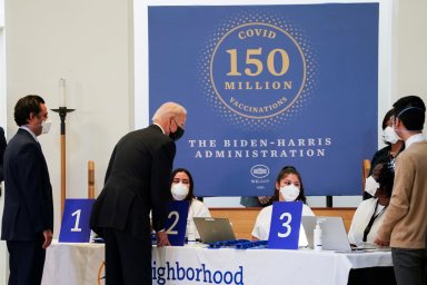 FILE PHOTO: U.S. President Joe Biden visits a vaccination site in Alexandria