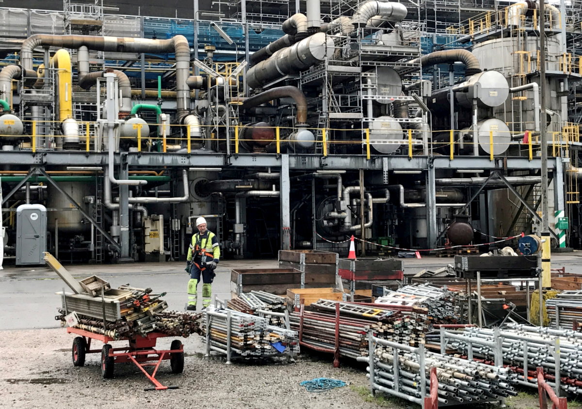 FILE PHOTO: A worker walks at the Yara ammonia plant in Porsgrunn