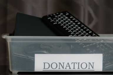 An office collection box for used computer equipment to be donated to the local community