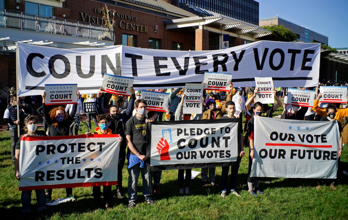 People take part in a rally demanding a fair count of the votes of the 2020 U.S. presidential election, in Philadelphia