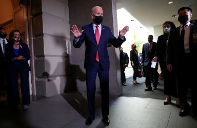 FILE PHOTO: U.S. President Joe Biden talks to reporters after meeting with Democratic lawmakers to promote his bipartisan infrastructure bill at U.S. Capitol in Washington