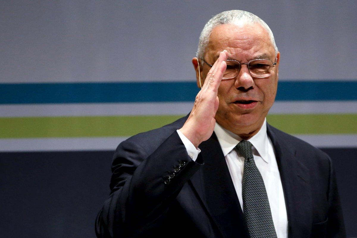 FILE PHOTO: Former U.S. Secretary of State Powell salutes the audience as he takes the stage at the Washington Ideas Forum in Washington