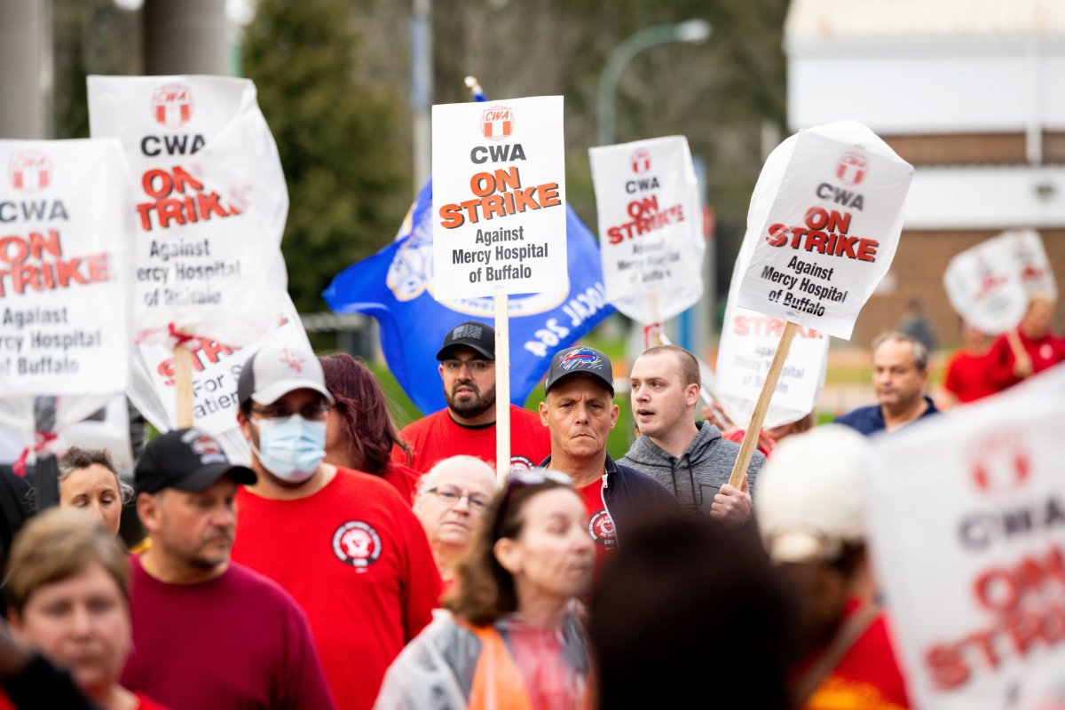 FILE PHOTO: Healthcare workers take part in a strike to protest hospital working conditions amid coronavirus disease (COVID-19)