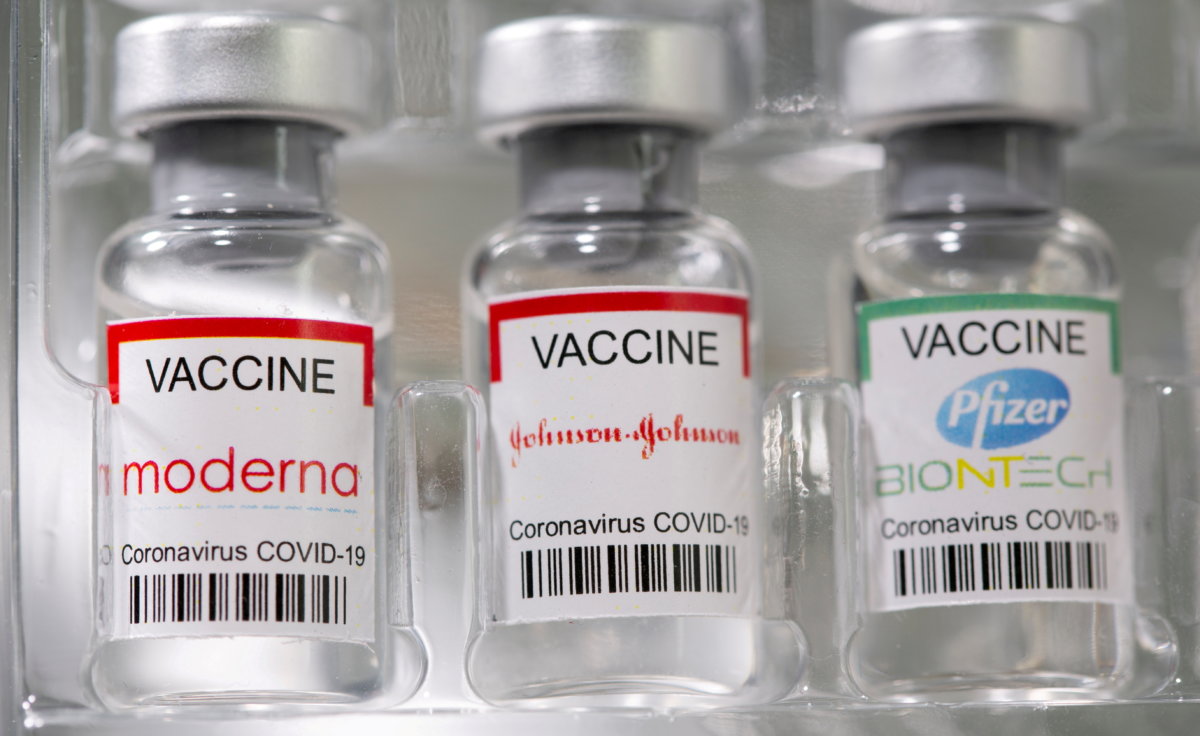 FILE PHOTO: Vials labelled “Moderna, Johnson & Johnson, Pfizer-BioNTech coronavirus disease (COVID-19) vaccine” are seen in this illustration picture